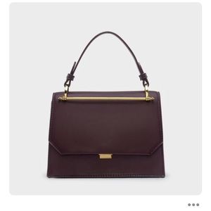 NWT CHARLES & KEITH structured small bag. BURGUNDY